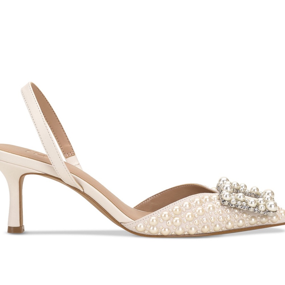 Glitzy in sparkling rhinestone accents, pointed-toe pumps by I.N.C